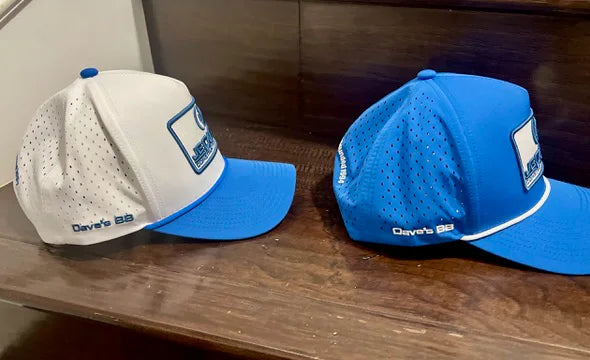 Side views of J. E. Dunn Construction Group custom hats